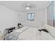 Light bedroom featuring a bed, table, and window at 1646 Highway 92 N, Fayetteville, GA 30214