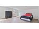 Expansive room featuring a bed, mannequin, and modern flooring at 1646 Highway 92 N, Fayetteville, GA 30214