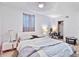 Comfortable bedroom with light, closet, and modern furniture at 1646 Highway 92 N, Fayetteville, GA 30214