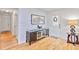 Entryway featuring hardwood floors, stylish console table, and decorative accents at 1646 Highway 92 N, Fayetteville, GA 30214