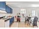 Efficient kitchen next to dining area with modern appliances at 1646 Highway 92 N, Fayetteville, GA 30214