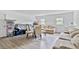 Uncluttered living room with neutral walls, modern furniture, and two windows at 1646 Highway 92 N, Fayetteville, GA 30214