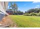 Exterior shot of the yard featuring a covered porch area at 1646 Highway 92 N, Fayetteville, GA 30214