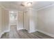 Finished basement with vinyl flooring and neutral walls offer versatile living space at 2922 Carriage Ln, Atlanta, GA 30349
