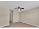 This empty bedroom features neutral walls, carpet and an open doorway at 7120 Oakley Ct, Union City, GA 30291