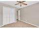 The bedroom has plush carpet and a double door closet at 7120 Oakley Ct, Union City, GA 30291
