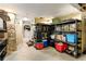 A basement with a stone wall and storage shelves, offering ample space for organization and storage at 138 Garland Ave, Decatur, GA 30030