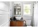Bright bathroom featuring a stylish vessel sink, modern vanity, and a window offering natural light at 138 Garland Ave, Decatur, GA 30030