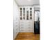 Walk-in closet featuring custom shelving, drawers, and hanging space for organized storage at 138 Garland Ave, Decatur, GA 30030