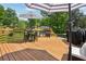 Spacious back deck featuring an outdoor dining area and lounge area at 1932 Brenda Dr, Austell, GA 30168