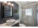 Charming bathroom with glass shower, round sink, and modern finishes at 1932 Brenda Dr, Austell, GA 30168