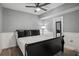 Stylish bedroom featuring a ceiling fan and hardwood floors at 1932 Brenda Dr, Austell, GA 30168