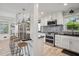 Well-equipped kitchen with stainless steel appliances, granite countertops, and a breakfast bar with barstool seating at 1932 Brenda Dr, Austell, GA 30168