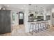 Modern kitchen featuring a breakfast bar, stainless steel appliances, and stylish pendant lighting at 1932 Brenda Dr, Austell, GA 30168