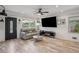 Comfortable living room with hardwood floors, great natural light, and stylish decor at 1932 Brenda Dr, Austell, GA 30168