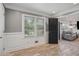 Well-lit room showcasing stylish design elements and access to additional living spaces at 1932 Brenda Dr, Austell, GA 30168