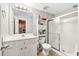 This bathroom features a vanity, mirror, and a shower at 5652 Harbormist Dr, Powder Springs, GA 30127