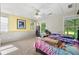 This bedroom has natural light from two windows and carpeted floors at 5652 Harbormist Dr, Powder Springs, GA 30127