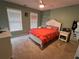 Inviting bedroom featuring natural light, a comfortable bed, and space for storage at 5652 Harbormist Dr, Powder Springs, GA 30127