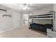 Bedroom with a bunk bed and a neutral carpet at 5652 Harbormist Dr, Powder Springs, GA 30127
