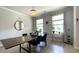 Dining room showcasing hardwood floors, a wooden table, natural light and neutral walls at 1835 Wellston Dr, Lawrenceville, GA 30043