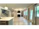 Open concept living space with a modern kitchen and a fireplace, perfect for entertaining at 1835 Wellston Dr, Lawrenceville, GA 30043