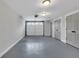 Clean garage with epoxy flooring, multiple storage closets and an automatic door at 2506 Octavia Ln, Marietta, GA 30062