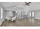 Open floor plan featuring a kitchen with island seating, and dining area with vaulted ceilings at 2506 Octavia Ln, Marietta, GA 30062