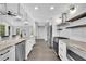 Modern kitchen with stainless steel appliances, granite countertops, and subway tile backsplash at 2506 Octavia Ln, Marietta, GA 30062