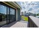 A beautiful lake view from the balcony's sliding glass doors and wooden railings at 325 Berry Ct, Villa Rica, GA 30180