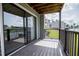 Balcony with sliding glass doors has a view of the lake and boat docks at 325 Berry Ct, Villa Rica, GA 30180
