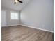 Bedroom with closet, high ceiling and large window at 325 Berry Ct, Villa Rica, GA 30180