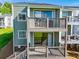 Condo building with stairs and a balcony that connects to the unit at 325 Berry Ct, Villa Rica, GA 30180