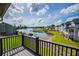 Waterfront condos boast green lawns, stone borders, and a small marina for boating at 325 Berry Ct, Villa Rica, GA 30180