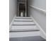 Staircase leading up to rooms with light gray paint at 325 Berry Ct, Villa Rica, GA 30180