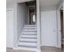 Staircase leading up to second floor with wood steps and access to rooms at 325 Berry Ct, Villa Rica, GA 30180