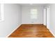 Bright bedroom featuring hardwood floors and a neutral color palette creating a relaxing space at 3900 Bressler Cir, Decatur, GA 30035