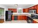 Charming kitchen with modern appliances, plenty of counter space, and stylish cabinetry for storage at 3900 Bressler Cir, Decatur, GA 30035