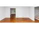 Open living room featuring hardwood floors, neutral walls, and natural light at 3900 Bressler Cir, Decatur, GA 30035
