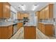 Kitchen with stainless steel appliances, granite countertops, and a center island at 4325 Camellia Ridge Sw Way, Lilburn, GA 30047