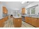 Kitchen featuring granite countertops, stainless appliances, and center island with sink at 4325 Camellia Ridge Sw Way, Lilburn, GA 30047