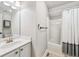 Simple bathroom with a vanity, toilet, and a bathtub with a shower curtain at 4915 Bayberry Dr, Cumming, GA 30040