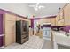 Functional kitchen with stainless steel appliances and ample cabinet space at 4915 Bayberry Dr, Cumming, GA 30040