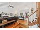 Spacious living room features hardwood floors, fireplace, and vaulted ceilings at 4915 Bayberry Dr, Cumming, GA 30040