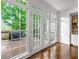 Bright eat-in kitchen with a full bank of windows overlooking the deck and backyard at 5065 Harbour Ridge Dr, Alpharetta, GA 30005