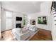 Bright living room boasts high ceilings, a fireplace and hardwood floors at 5065 Harbour Ridge Dr, Alpharetta, GA 30005