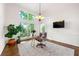 Bright office space featuring large windows, hardwood floors and a unique chair at 5065 Harbour Ridge Dr, Alpharetta, GA 30005