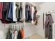 Walk-in closet featuring organized clothing racks and shelves for efficient storage at 5065 Harbour Ridge Dr, Alpharetta, GA 30005