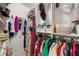 Walk-in closet with shelves and hanging rods providing ample storage for clothing and accessories at 5065 Harbour Ridge Dr, Alpharetta, GA 30005