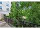 Private balcony providing a serene view of lush greenery and mature trees at 743 Taylor Ne Ct, Atlanta, GA 30324